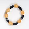 Picture of Solar Flare Bracelet: Yellow Calcite with Onyx Elegance